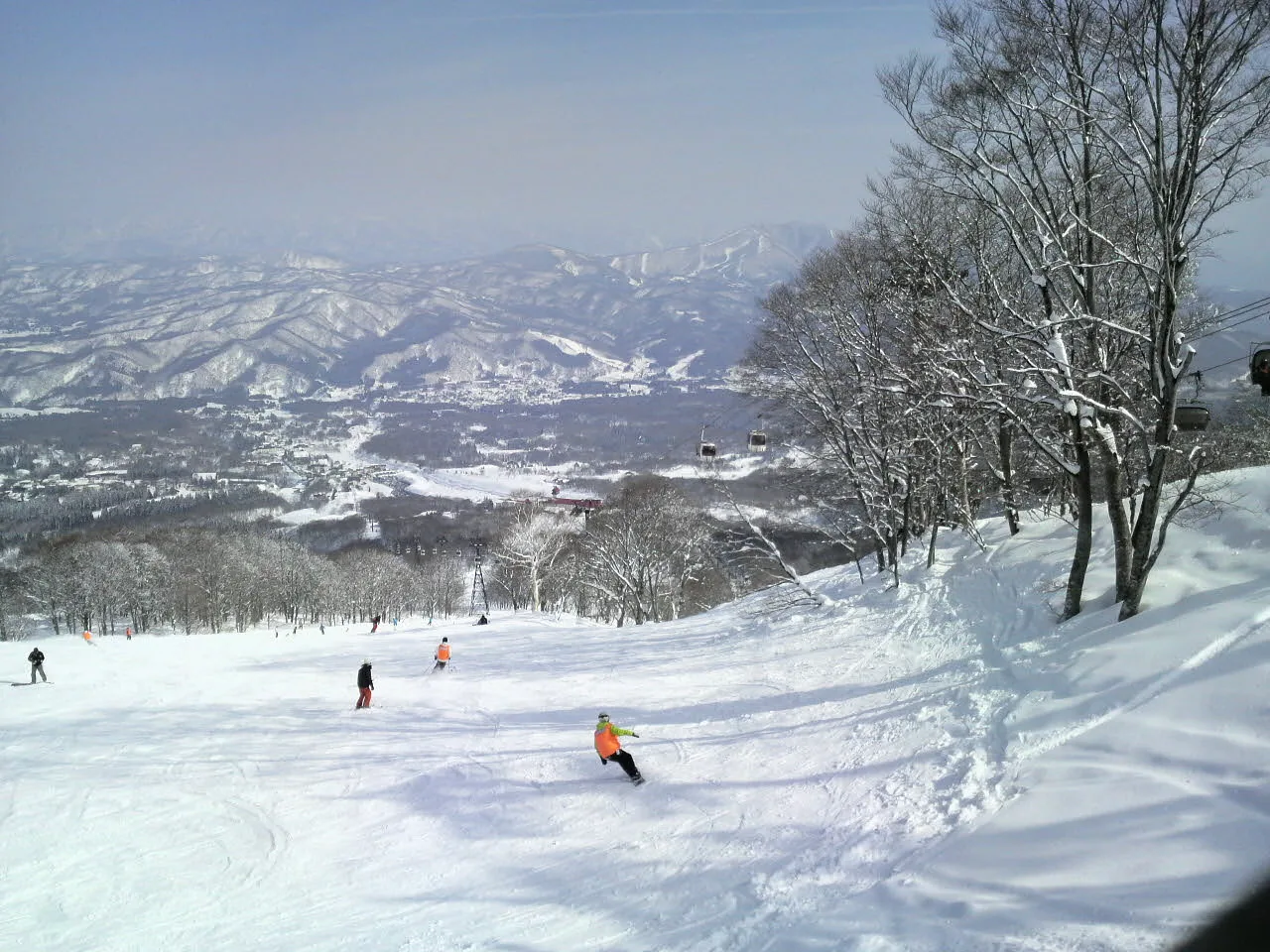 Skiers on the slopes at Akakura Kanko in winter